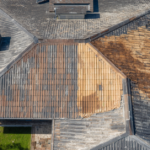 Moss re-establishing on a painted tile roof in South-West Sydney